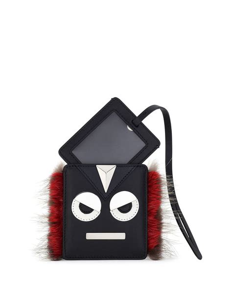 fendi monster black leather luggage charm tag|Fendi Monster Black Leather Luggage Charm Tag .